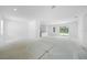 Expansive living area with abundant natural light, eat-in kitchen, offering a canvas for personalization and comfort at 5018 Cillette Ave, North Port, FL 34288