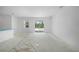 Open living area with a glass slider to backyard and light-filled ambiance, ready for personal design at 5018 Cillette Ave, North Port, FL 34288