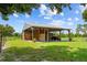 Exterior view of barn, featuring an open design for ample ventilation and equipment storage at 5221 Blackjack Cir, Punta Gorda, FL 33982