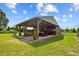 Exterior view of barn, offering storage space and shelter for equipment, enhancing rural property appeal at 5221 Blackjack Cir, Punta Gorda, FL 33982