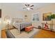 This bedroom has a bed, a window, and a ceiling fan at 5221 Blackjack Cir, Punta Gorda, FL 33982
