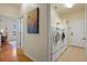 A bright laundry room with a washer and dryer at 5221 Blackjack Cir, Punta Gorda, FL 33982
