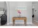Stylish foyer featuring coastal decor and light wood flooring at 5273 Crestline Ter, Port Charlotte, FL 33981
