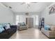 Living room area featuring wood floors and beach themed decor at 5273 Crestline Ter, Port Charlotte, FL 33981
