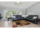 Living room featuring ample natural light and comfortable seating with open floor plan at 5273 Crestline Ter, Port Charlotte, FL 33981