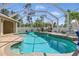 Beautiful pool and outdoor space with a screened enclosure at 5273 Crestline Ter, Port Charlotte, FL 33981
