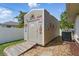 Outdoor shed with Coca-Cola signs and gravel landscaping at 5273 Crestline Ter, Port Charlotte, FL 33981