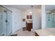 Bright bathroom featuring a glass enclosed shower, granite countertops, and a neutral color palette for a spa-like experience at 591 San Ambrosio St, Punta Gorda, FL 33983