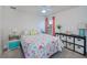 Bedroom with soft carpet, ceiling fan, and side tables for comfort and style, providing a cozy living space at 591 San Ambrosio St, Punta Gorda, FL 33983