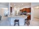 Open kitchen with stainless steel appliances, ample counter space, and a breakfast bar with seating for casual dining at 591 San Ambrosio St, Punta Gorda, FL 33983