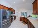 Modern kitchen with stainless steel appliances and ample countertop space at 591 San Ambrosio St, Punta Gorda, FL 33983