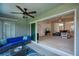 Relaxing outdoor lanai features comfortable seating and a ceiling fan, perfect for enjoying the beautiful weather at 591 San Ambrosio St, Punta Gorda, FL 33983