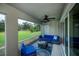 Cozy patio featuring comfortable seating and a ceiling fan for relaxing outdoors at 591 San Ambrosio St, Punta Gorda, FL 33983