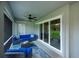 Inviting patio with comfortable seating and a ceiling fan, perfect for outdoor relaxation at 591 San Ambrosio St, Punta Gorda, FL 33983