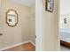 Walk-in closet with neutral walls, tile flooring, and a wire shelf for additional storage at 7280 Muncey Rd, North Port, FL 34291