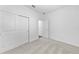 Bedroom with carpet, closet, and ensuite bathroom at 7345 Ellis Ln, Port Charlotte, FL 33981