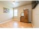 A lovely bedroom is complete with an armoire and wooden floors at 7424 Acorn Blvd, Punta Gorda, FL 33982
