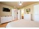 This bedroom boasts hardwood floors, recessed lighting, and white dressers at 7424 Acorn Blvd, Punta Gorda, FL 33982
