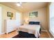 Cozy bedroom with neutral decor and hardwood floors at 7424 Acorn Blvd, Punta Gorda, FL 33982
