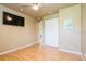 This bedroom features hardwood floors and a double door closet at 7424 Acorn Blvd, Punta Gorda, FL 33982