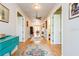 Hallway with hardwood floors leading to dining room at 7424 Acorn Blvd, Punta Gorda, FL 33982