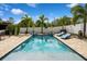 Inviting backyard pool area with ample lounging space and a privacy fence at 7424 Acorn Blvd, Punta Gorda, FL 33982