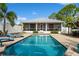 Inviting pool area with a large pool and plenty of space for relaxing in the backyard at 7424 Acorn Blvd, Punta Gorda, FL 33982