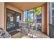 Balcony seating area with palm tree views at 90 Vivante Blvd # 202, Punta Gorda, FL 33950