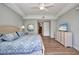 Spacious bedroom featuring a comfortable bed, modern TV, and plenty of closet space, offering a relaxing retreat at 90 Vivante Blvd # 202, Punta Gorda, FL 33950
