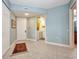 Inviting entryway with tile floors, a coat closet, and a convenient laundry area at 90 Vivante Blvd # 202, Punta Gorda, FL 33950