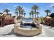 Beautiful dolphin fountain with swimming pool beyond at 90 Vivante Blvd # 202, Punta Gorda, FL 33950