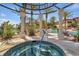 Relaxing hot tub near a swimming pool at 90 Vivante Blvd # 202, Punta Gorda, FL 33950