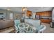 Open-concept design featuring a modern kitchen and breakfast nook with views of the living area at 90 Vivante Blvd # 202, Punta Gorda, FL 33950