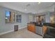 Bright kitchen area with stainless steel appliances, granite counters, and natural light from large windows at 90 Vivante Blvd # 202, Punta Gorda, FL 33950