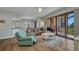 Cozy living room features a plush sofa, stylish coffee table, and sliding glass doors to a patio at 90 Vivante Blvd # 202, Punta Gorda, FL 33950