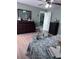 Cozy bedroom with a large mirror, dresser, and unique decor elements, creating a comfortable ambiance at 93 Boundary Blvd # 303, Rotonda West, FL 33947