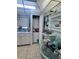 This kitchen features a washer and dryer, located in a closet at 93 Boundary Blvd # 303, Rotonda West, FL 33947