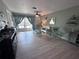An inviting living room with comfortable seating and a view of the patio at 93 Boundary Blvd # 303, Rotonda West, FL 33947