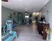 This living room has light green walls and a wide open floor plan at 93 Boundary Blvd # 303, Rotonda West, FL 33947