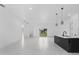 Bright, airy living space featuring modern finishes and an open concept layout with a kitchen island at 165 Ingram Blvd, Rotonda West, FL 33947