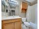 Bathroom with a vanity, toilet, shower/tub combo, and tile flooring at 1273 Jonah Dr, North Port, FL 34289