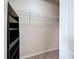A walk-in closet with shelving to maximize storage space at 1273 Jonah Dr, North Port, FL 34289