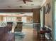 Inviting clubhouse interior with wicker chairs, wooden floors, and stylish decor for a welcoming ambiance at 1273 Jonah Dr, North Port, FL 34289