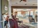 Cozy clubhouse interior with fireplace, leather chairs and stylish Autumn decor for a relaxing atmosphere at 1273 Jonah Dr, North Port, FL 34289