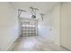 Spacious garage with an automatic door and ample room for storage at 1273 Jonah Dr, North Port, FL 34289
