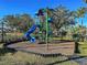 Colorful community playground with slide and climbing structures, perfect for outdoor fun at 1273 Jonah Dr, North Port, FL 34289