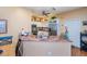 This kitchen features granite countertops, stainless steel appliances, and light colored cabinetry at 1318 Red Oak Ln, Port Charlotte, FL 33948