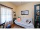 Cozy home office featuring stylish decor and a comfortable couch at 1318 Red Oak Ln, Port Charlotte, FL 33948