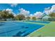 Inviting tennis courts with great views and seating options, designed for both competitive play and casual enjoyment at 1318 Red Oak Ln, Port Charlotte, FL 33948