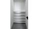 A walk-in closet has a clothing rod and adjustable shelving at 13406 Chenille Dr, Port Charlotte, FL 33981